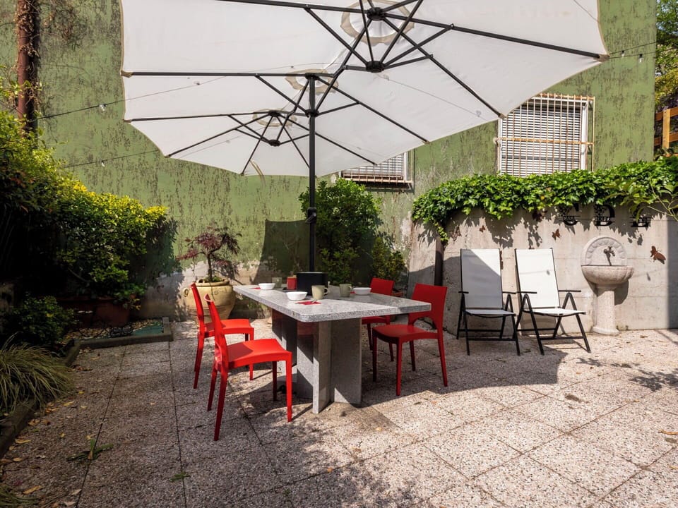 Furniture, Chair, Outdoor Furniture, Table, Outdoor Table, Umbrella, Shade, Kitchen & Dining Room Table, Restaurant, Coffee Table