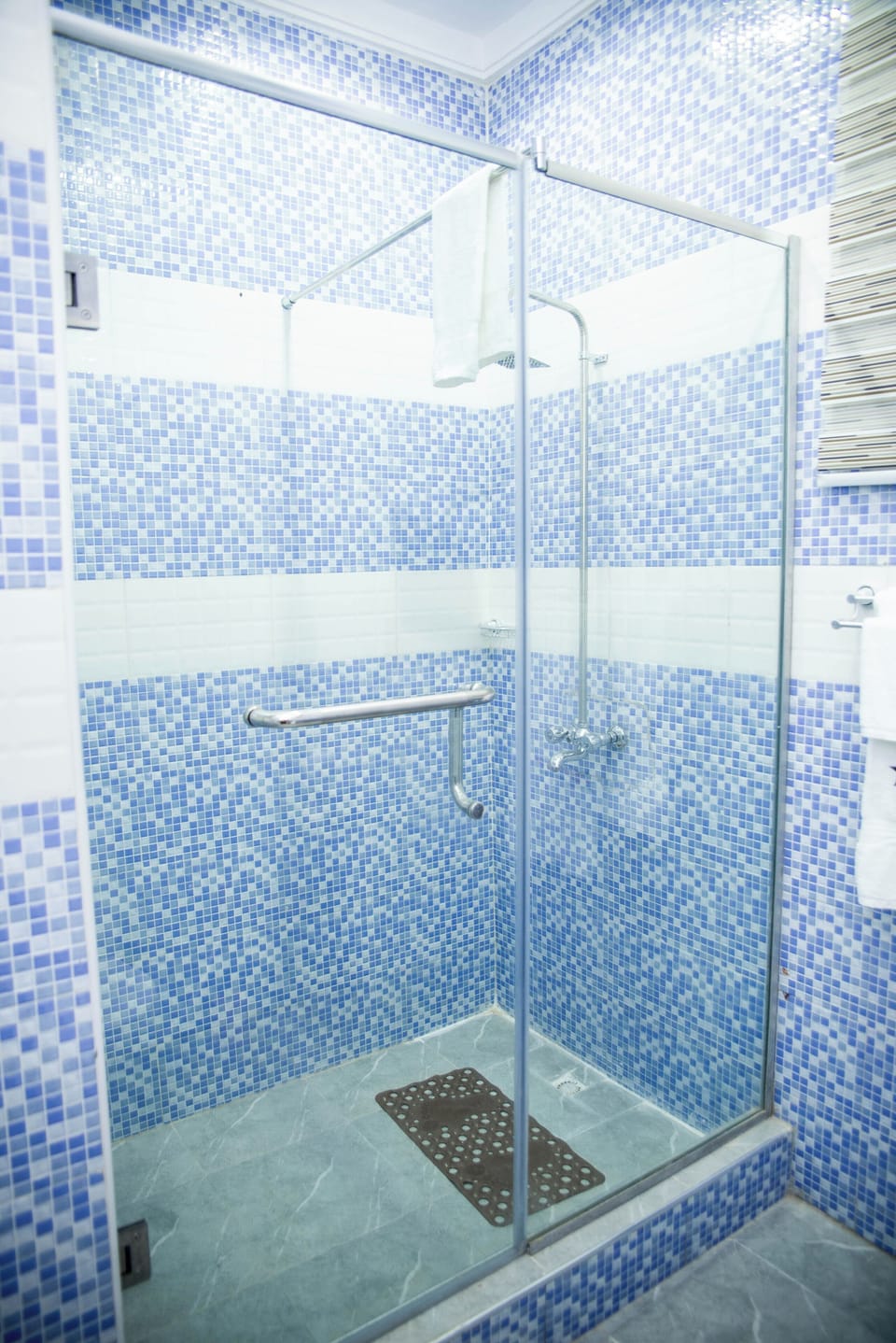 Shower, towels, soap, shampoo