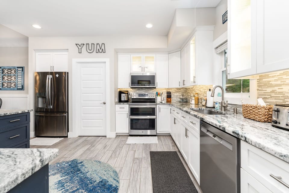 kitchen - hosted by lakegastonvacationhomes