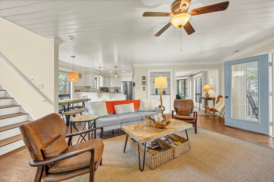Picture yourself unwinding in this inviting open-concept living space with stylish coastal charm, modern comforts, and natural light flowing through every corner of your home away from home.
