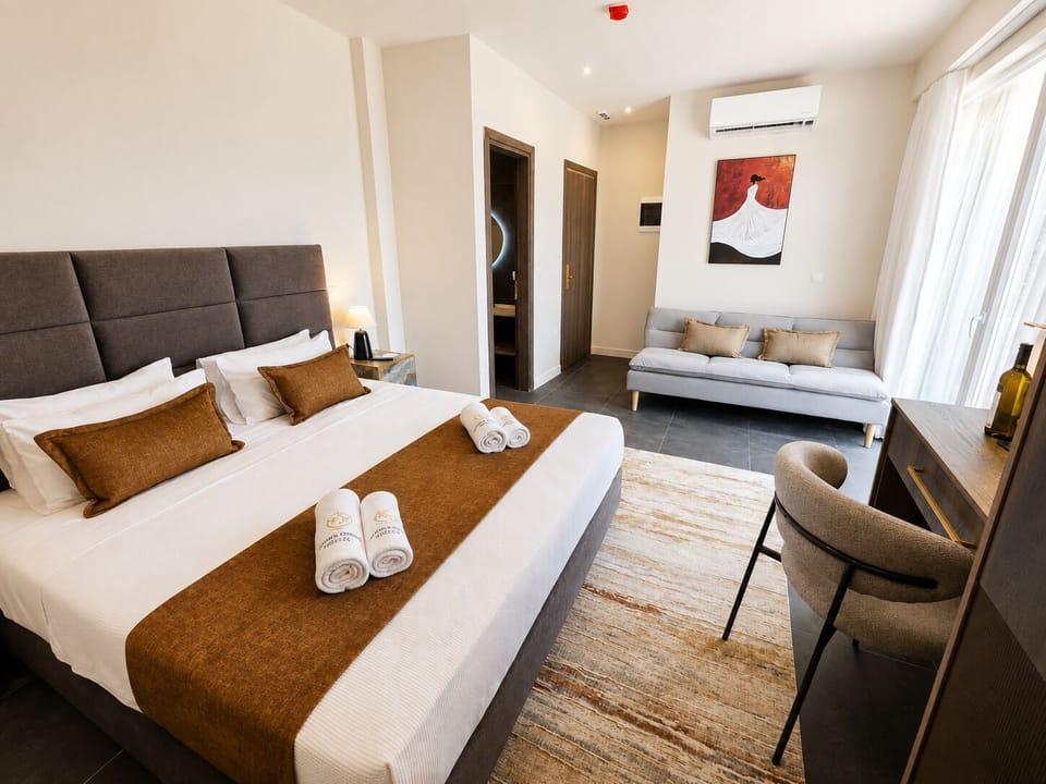 Deluxe Room with Balcony & Panoramic View | In-room safe, blackout drapes, iron/ironing board (on request)