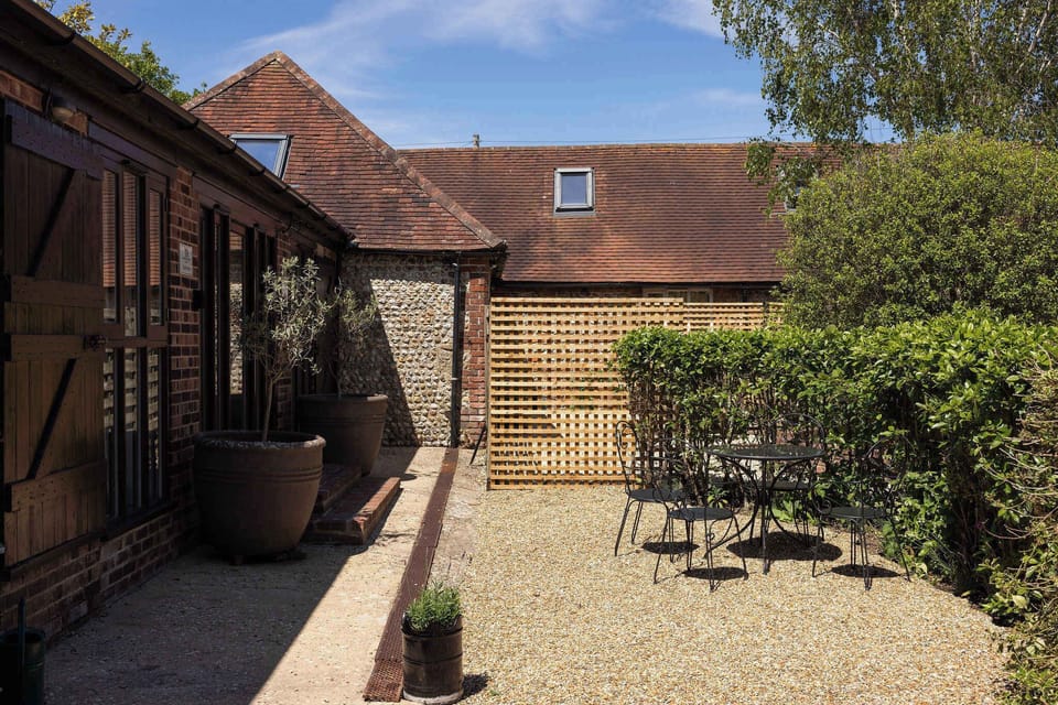 There is a pretty, shared courtyard area with seating (shared with another ensuite room) to enjoy a morning coffee or evening drink.