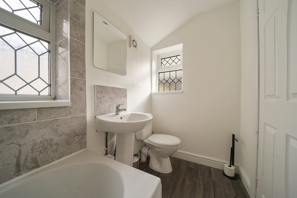 Bathroom with toilet and basin