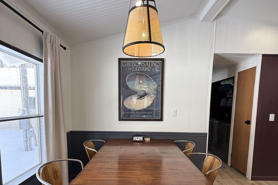 The dining room offers comfortable seating for shared meals and gatherings
