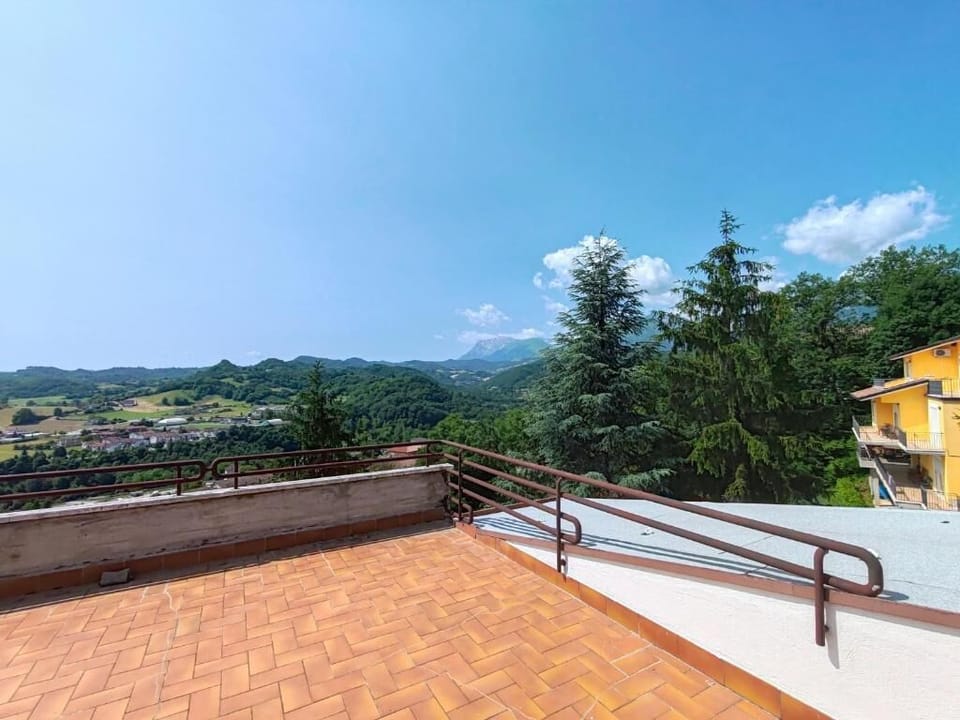 Family Triple Room, Balcony, City View | Property grounds