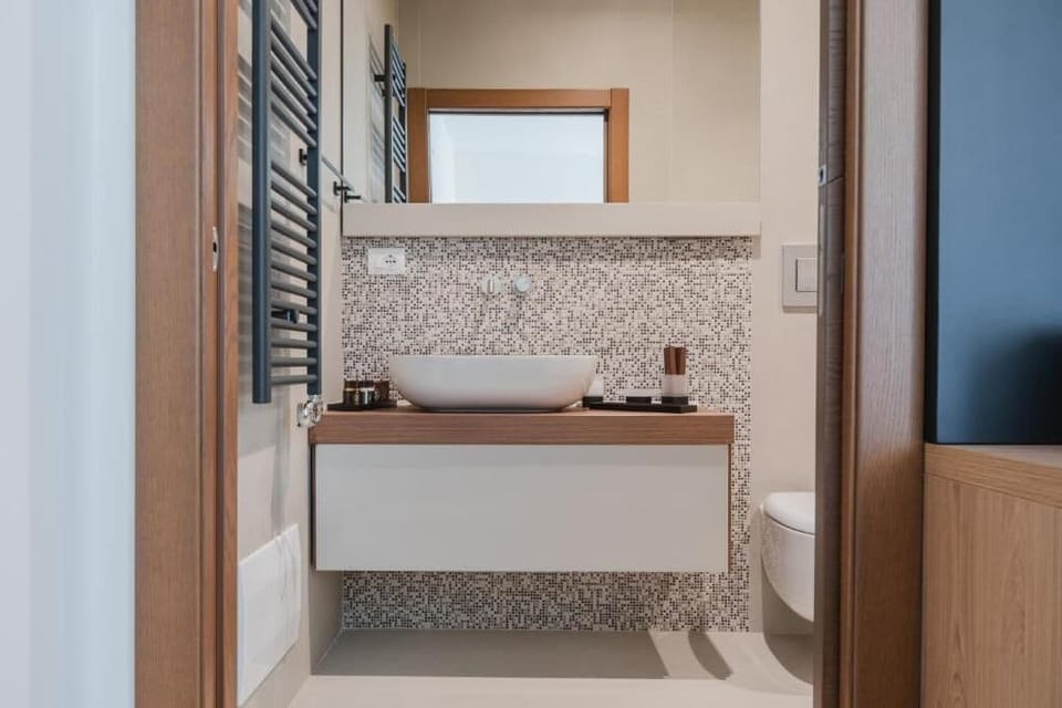Shower, free toiletries, hair dryer, slippers