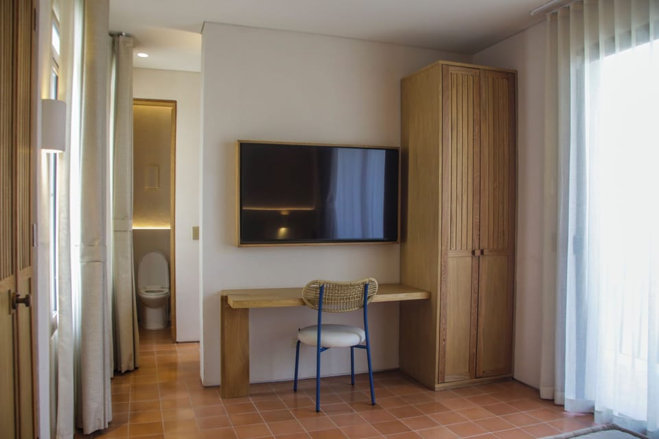 Desk, laptop workspace, blackout drapes, WiFi (free)