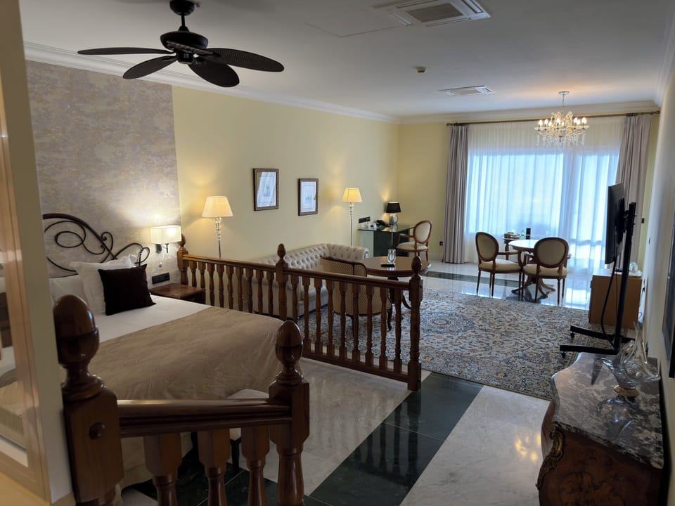 Premium bedding, down comforters, minibar, in-room safe