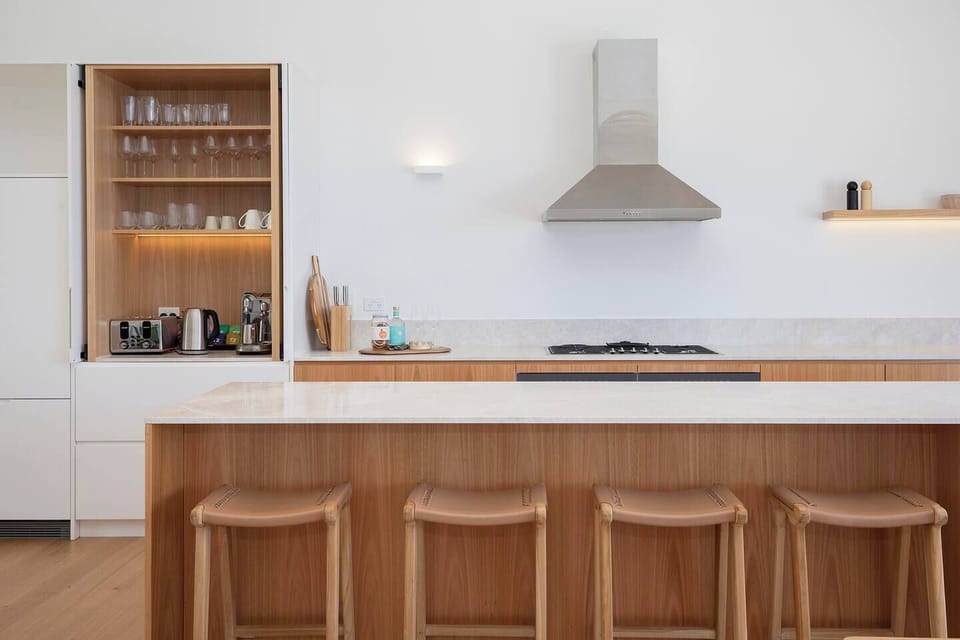 Pull up a stool at the kitchen island and enjoy casual breakfasts or evening drinks while meals come together in the fully equipped kitchen.