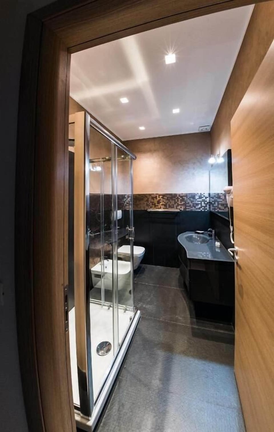Comfort Quadruple Room, 2 Bedrooms, City View | Bathroom | Free toiletries, hair dryer, towels, soap