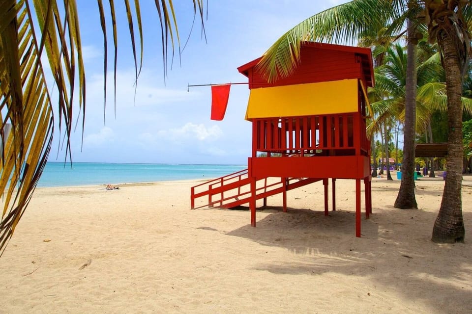 “Beautiful Balneario La Monserrate is just a short drive away, offering soft sand, palm trees, and the turquoise waters of Luquillo.”