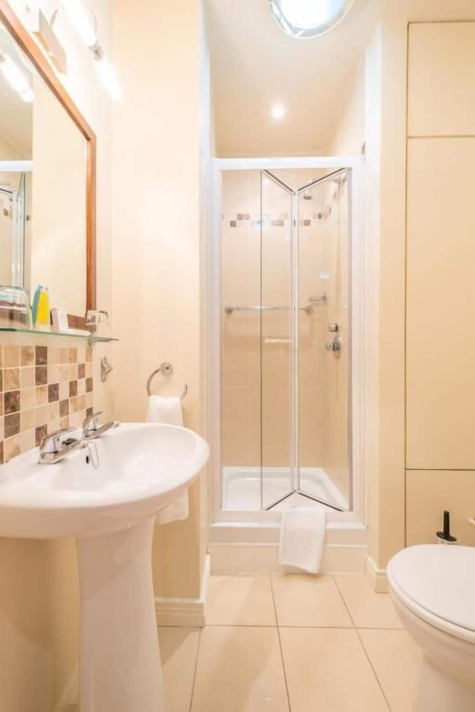 Shower, free toiletries, hair dryer, towels