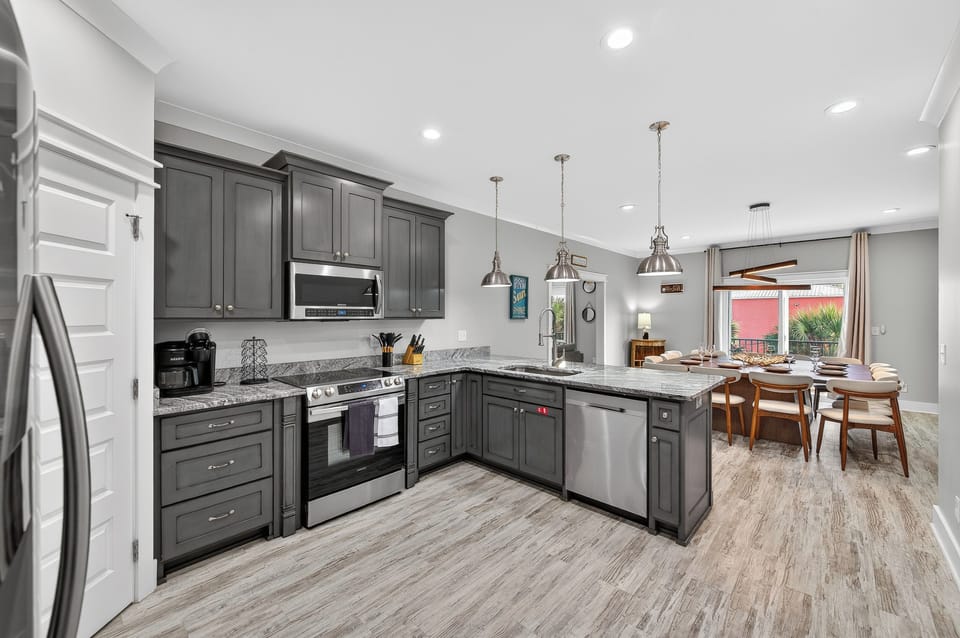 This home comes with two kitchens, two stoves, two fridges