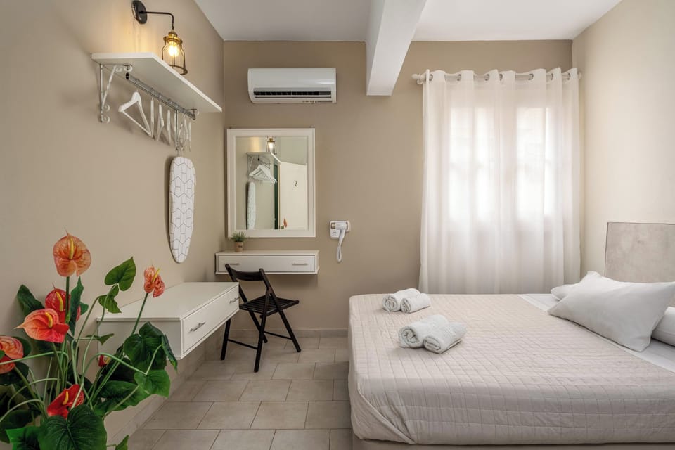 Blackout drapes, soundproofing, iron/ironing board