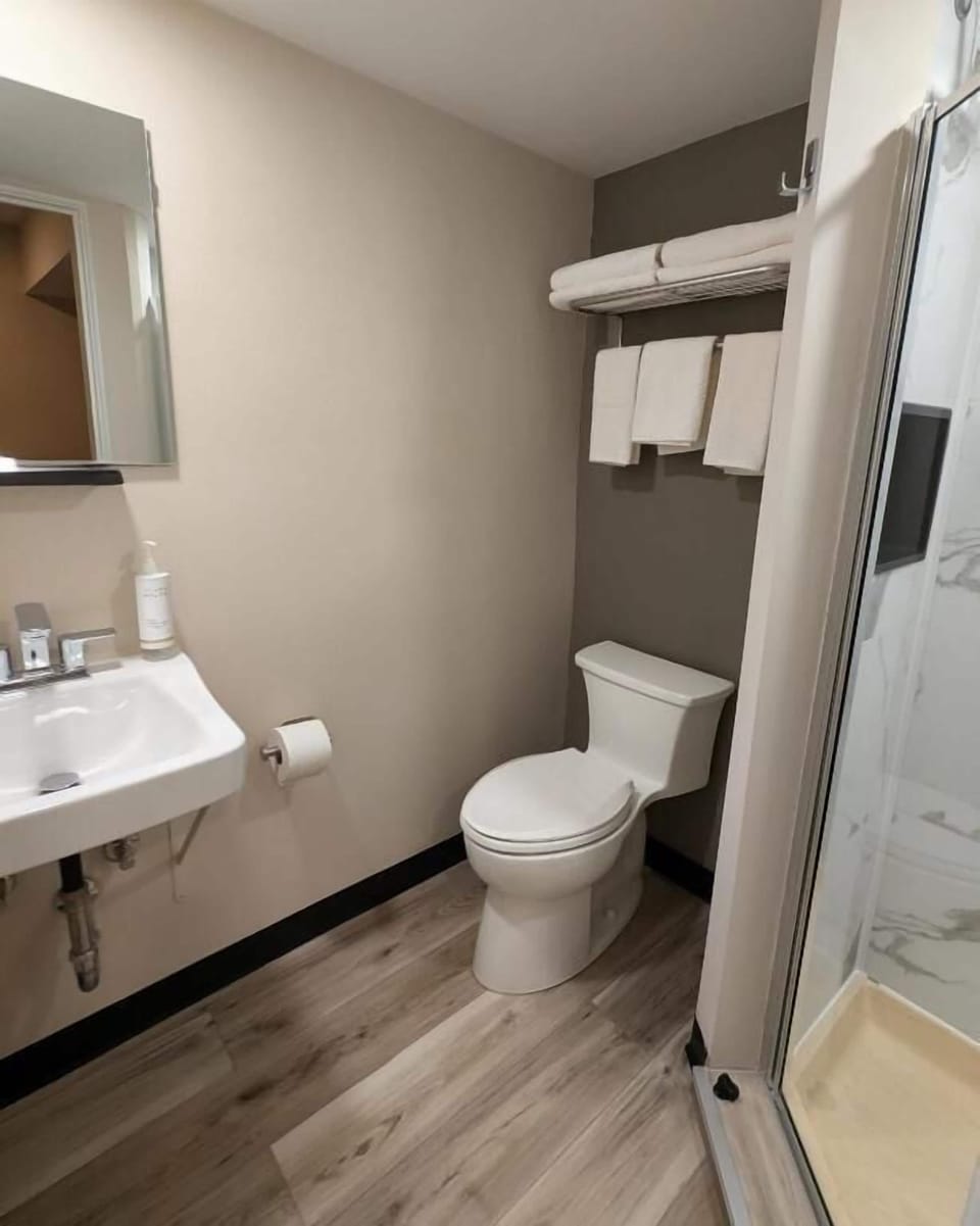 Shower, free toiletries, towels, soap