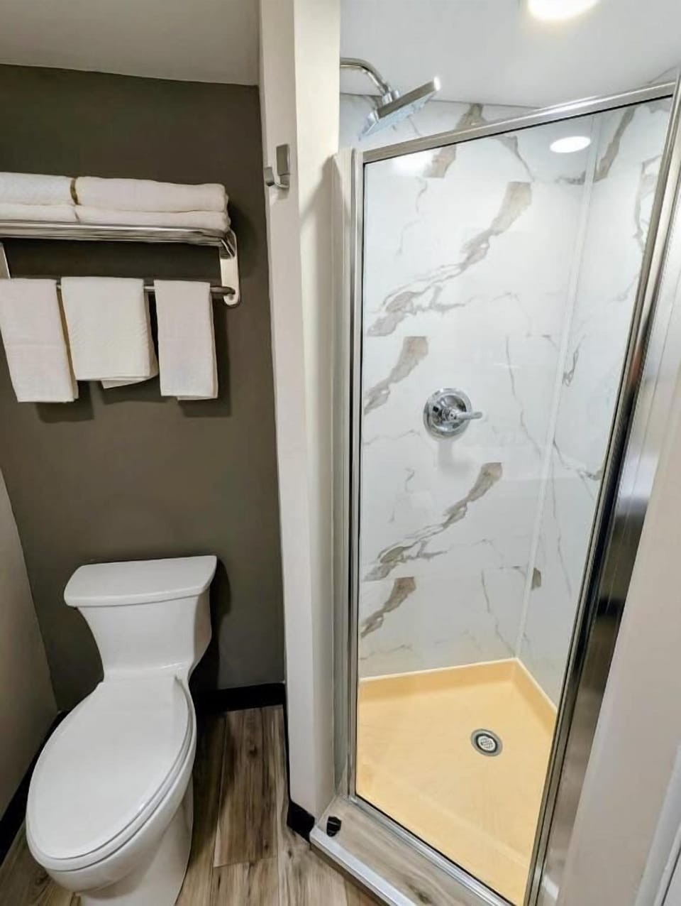 Shower, free toiletries, towels, soap