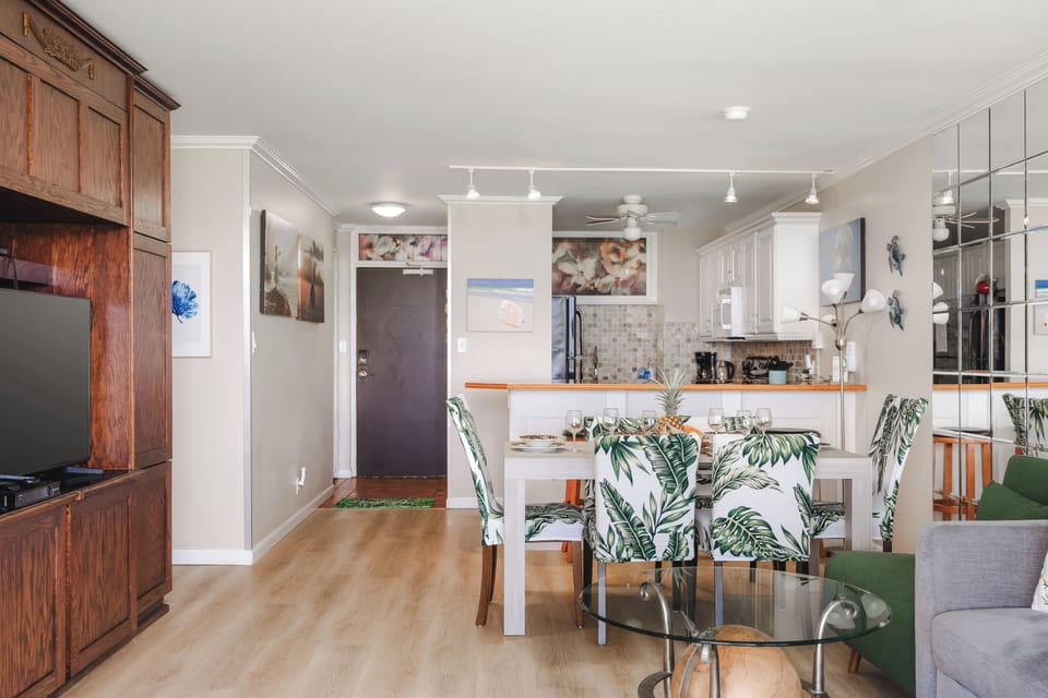 Spacious living, dining, and kitchen layout with ocean views nearby!