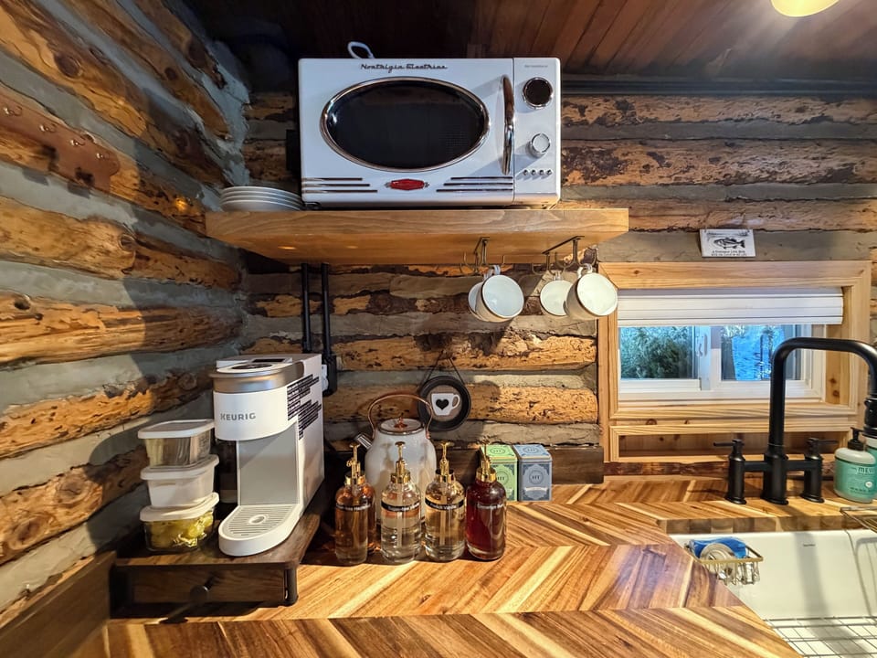 Coffee and tea station. Microwave.