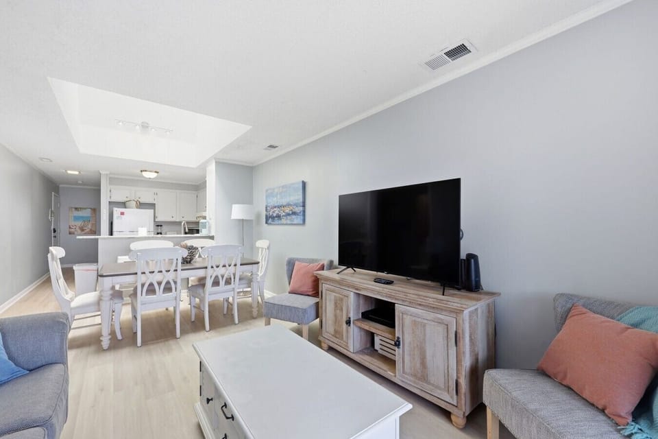 Relax, dine, and unwind in this inviting open-concept living space designed for comfort