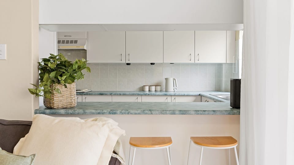 Modern kitchen with breakfast seating and open layout