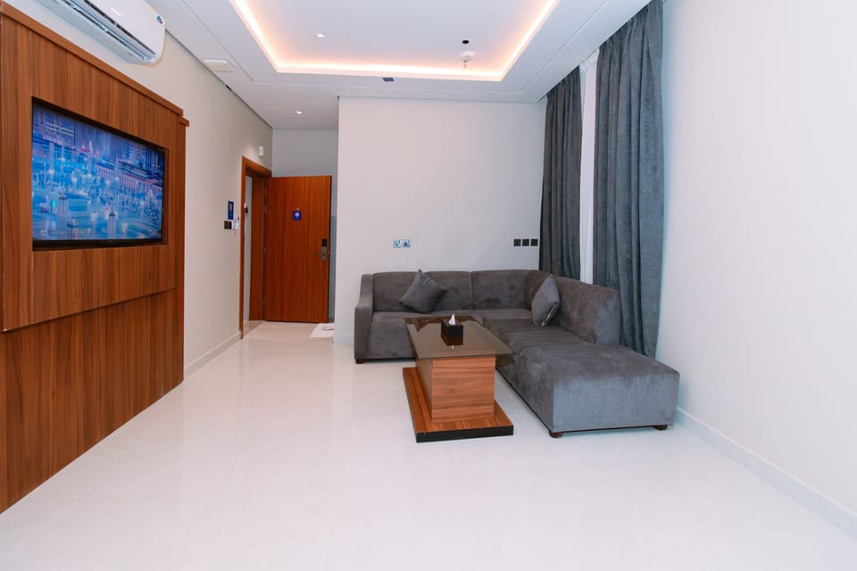 Junior Suite, City View | In-room safe, desk, laptop workspace, blackout drapes