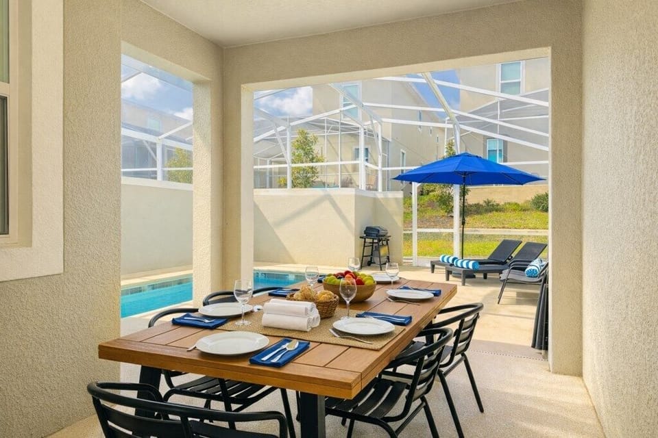 Sunny Florida patio with pool view