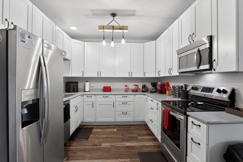 Fully Equipped Kitchen fitted with sharp knives, lots of cooking gadgets and a spice rack.  Coffee corner with several options!  Keurig, Nespresso, French Press, and traditional.