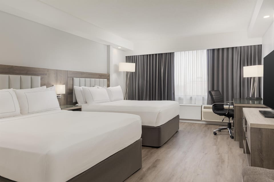 2 Queen Beds Suite with Living Room | Premium bedding, down comforters, pillowtop beds, in-room safe