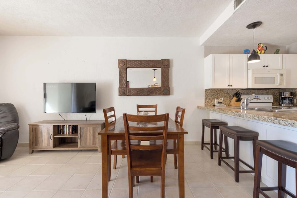 Kitchen bar next to Dining table