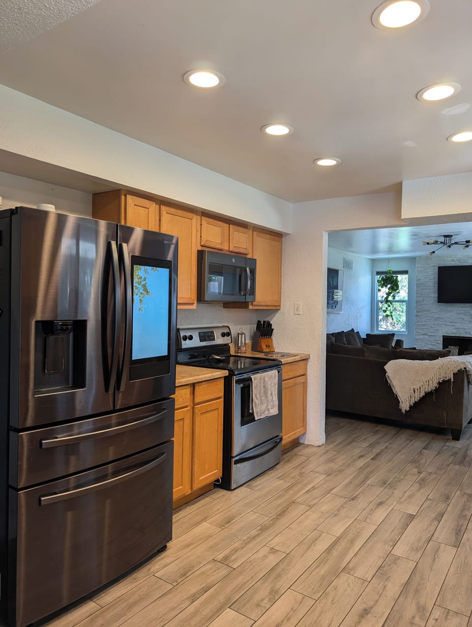 Kitchen with modern refrigerator. 