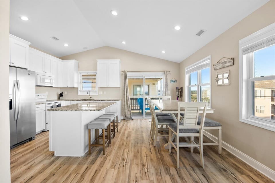 Share meals and memories around the large dining table with seating for the whole group.