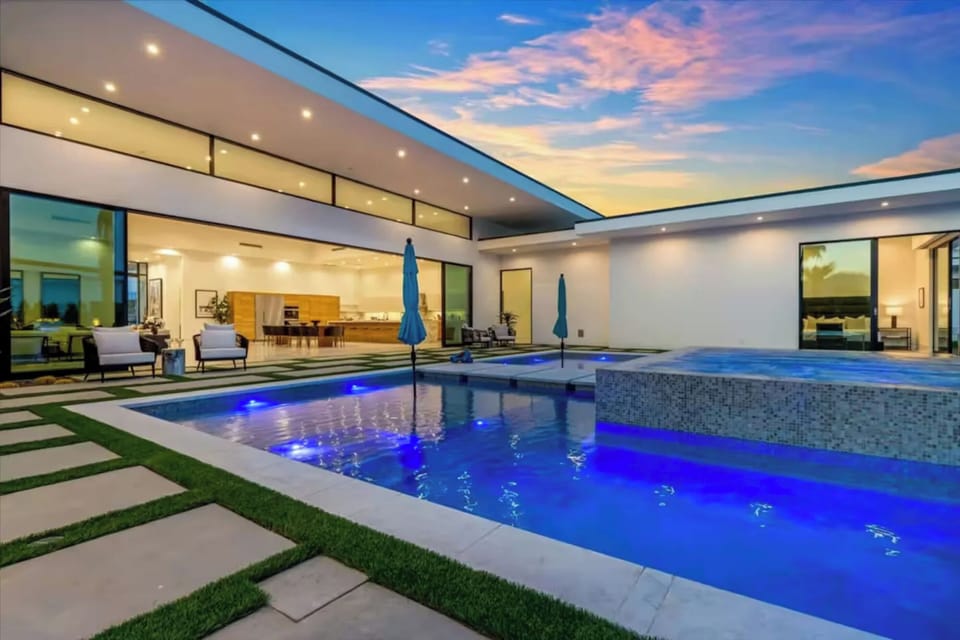 Glowing pool at night. (Villa 5)