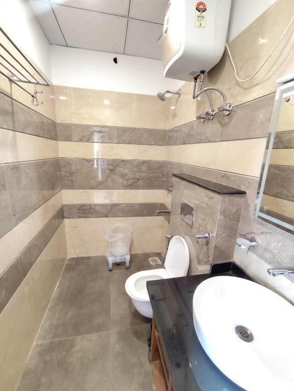 Shower, free toiletries, slippers, towels