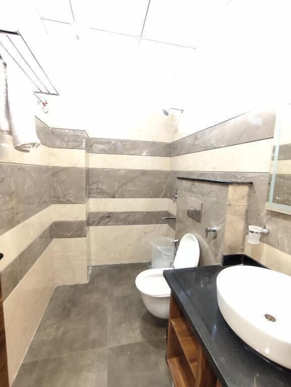 Shower, free toiletries, slippers, towels