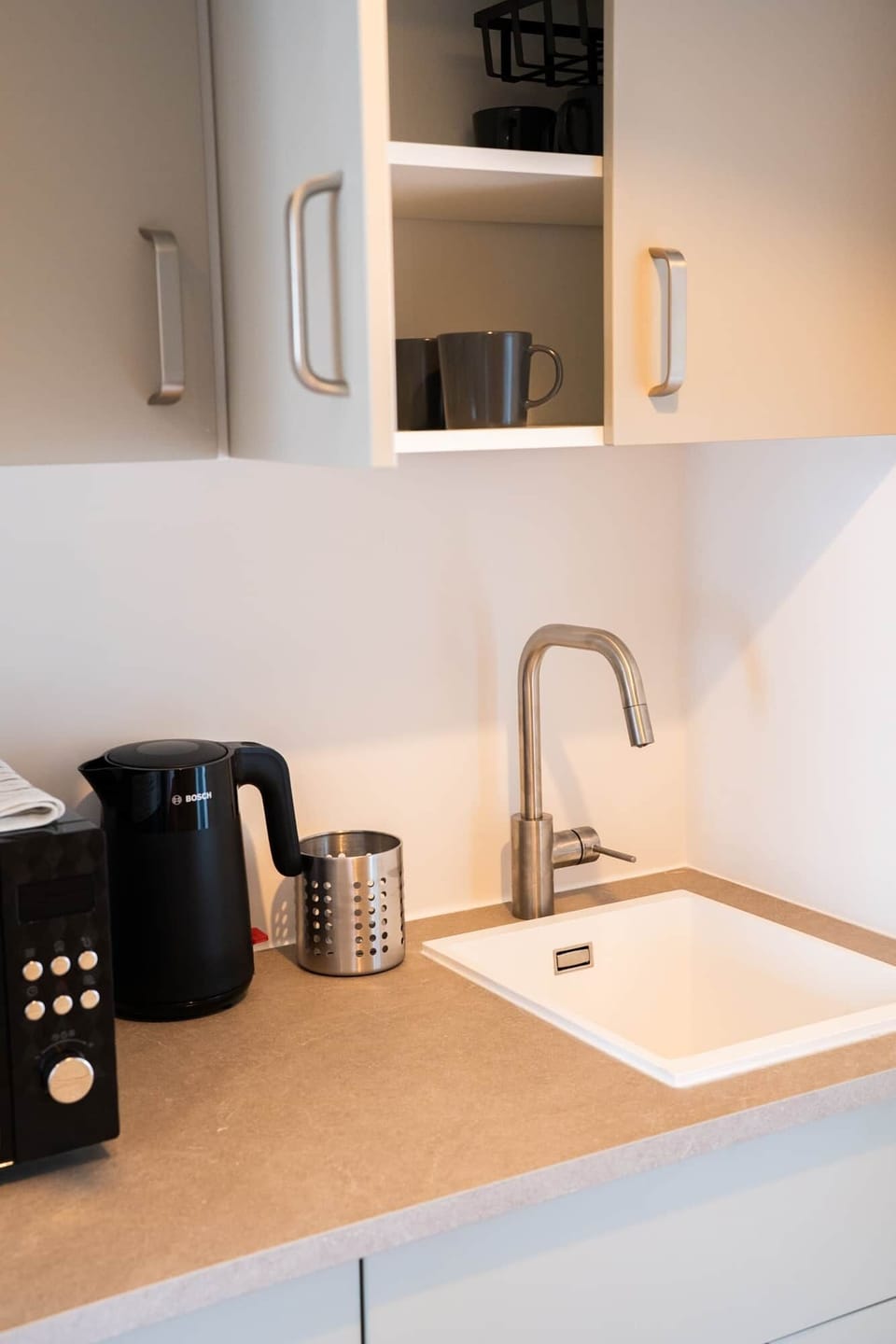 Modern kitchen tap and kettle — everything you need in