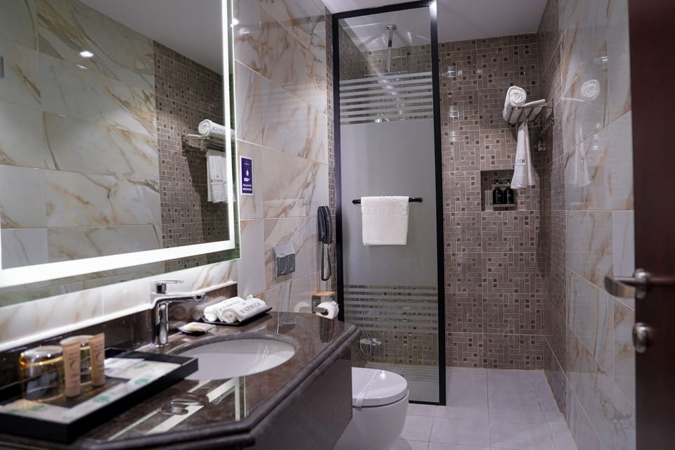 Shower, free toiletries, hair dryer, bathrobes