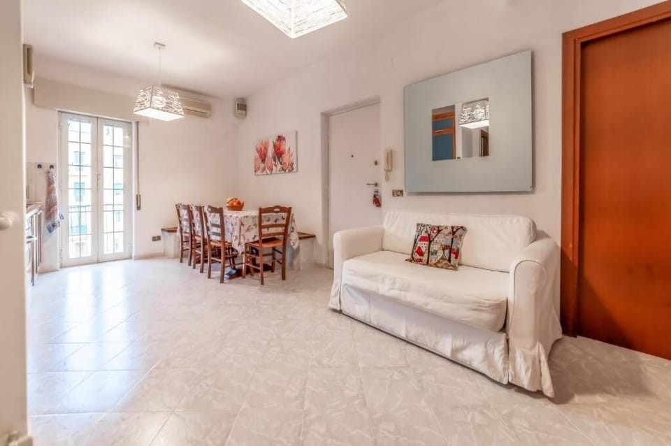 Apartment, Balcony, City View | Living area | Flat-screen TV