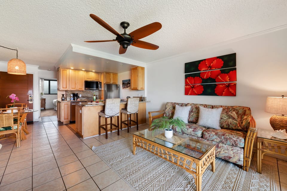 Relaxing seating space with sofa, coffee table, and island-style décor.