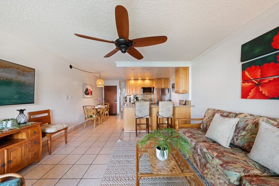 Open layout connects living room, dining area, and kitchen.