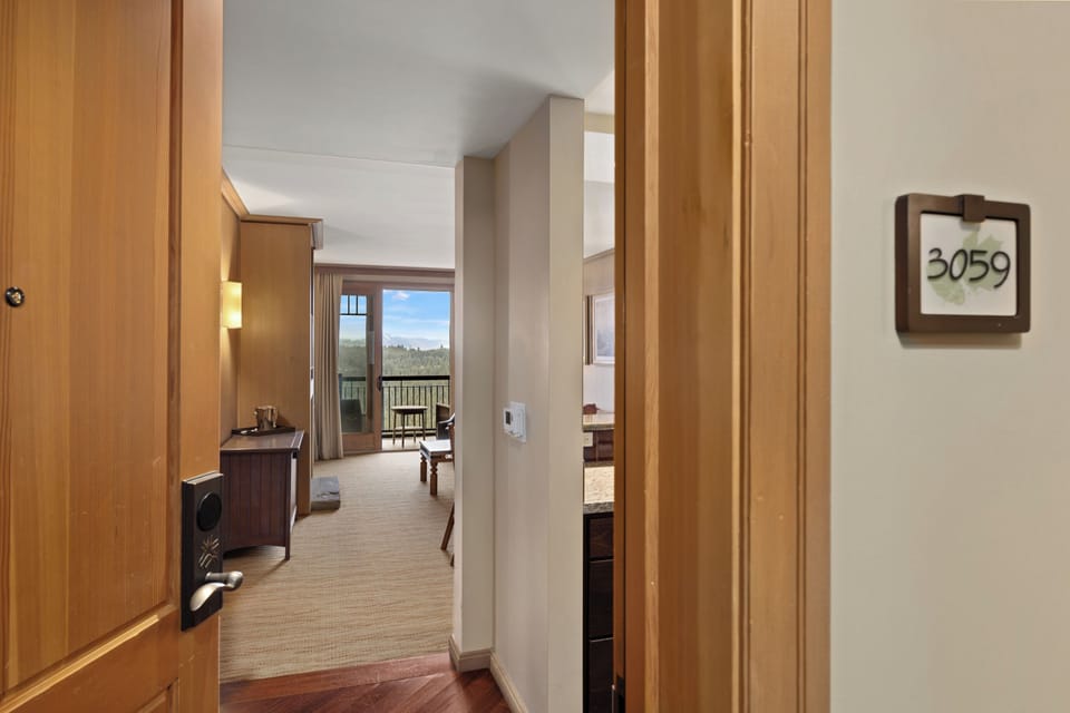 Welcoming entryway that leads into a bright and beautifully designed living space, setting the tone for a comfortable and relaxing stay from the moment you arrive.