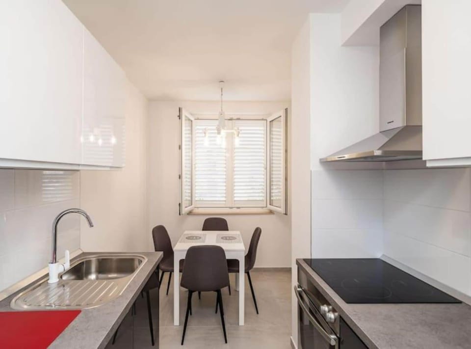 Apartment (One Bedroom Apartment with Balcony) | Private kitchen | Fridge