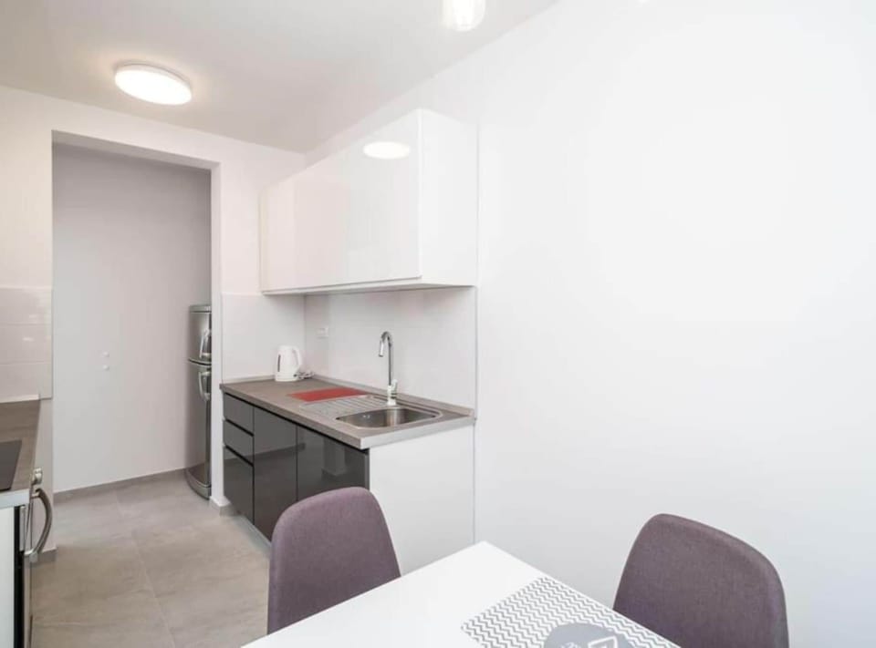 Apartment (One Bedroom Apartment with Balcony) | Private kitchen | Fridge