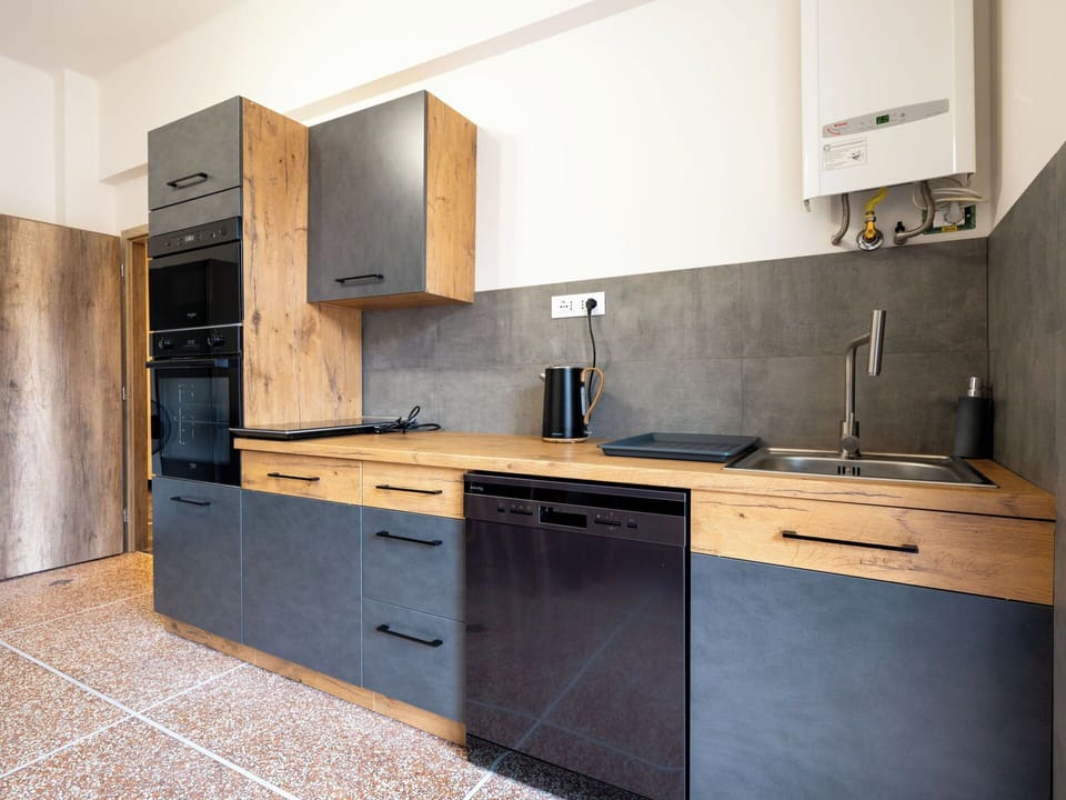 Countertop, Flooring, Wood, Kitchen Appliance, Cabinetry, Kitchen, Furniture, Major Appliance, Interior Design, Home Appliance