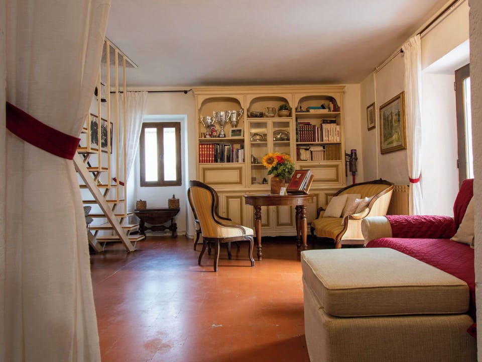 Furniture, Interior Design, Flooring, Wall, Floor, Wood, Ceiling, Room, Bookcase, Shelf