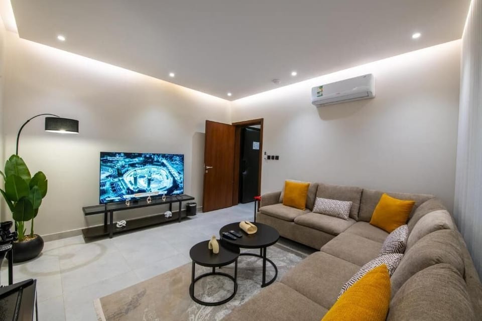 Apartment, 1 Bedroom | Living area | Flat-screen TV