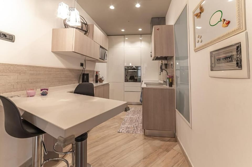 Apartment, Garden View | Private kitchen | Fridge, microwave, stovetop, espresso maker