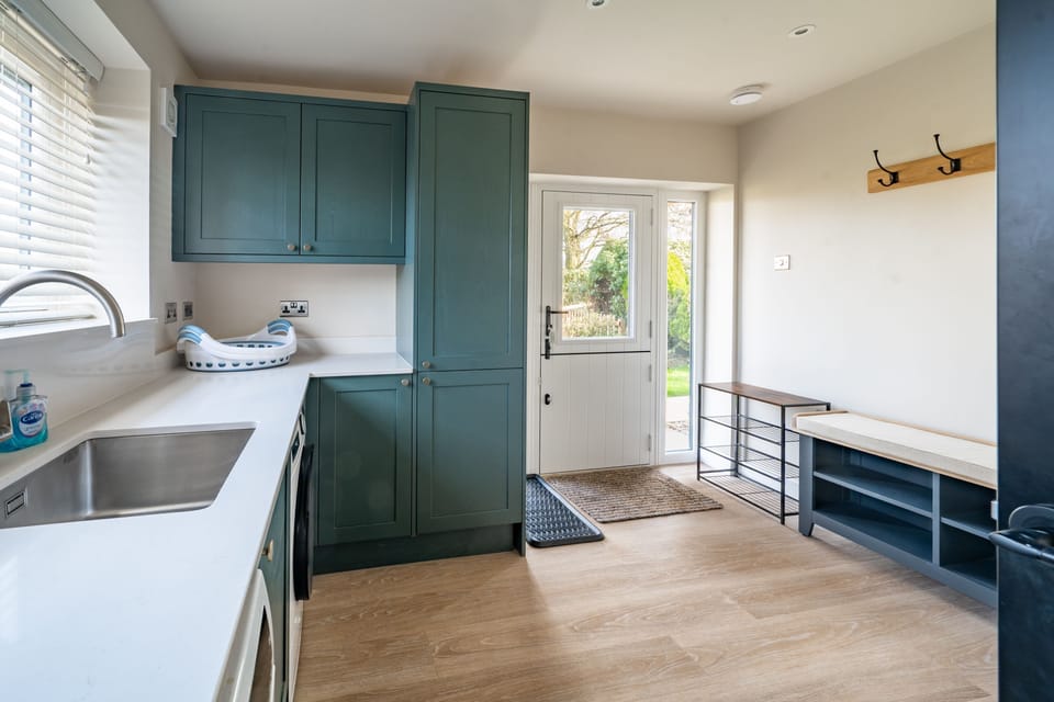 Ground floor: Utility with space for wet coats, boots and dogs