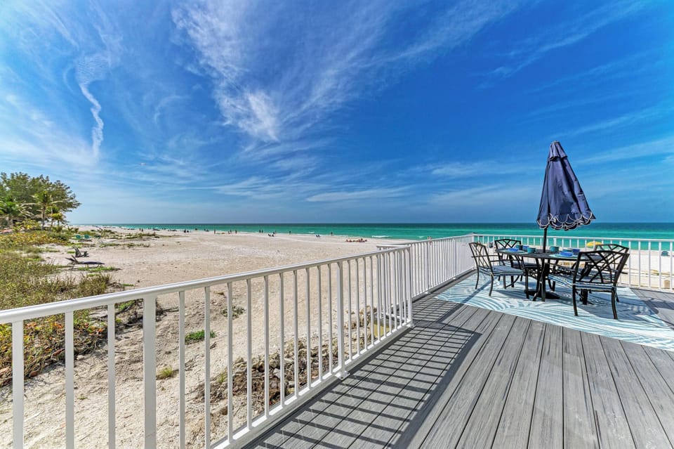 Your private deck overlooks pristine turquoise waters where you'll savor morning coffee and evening cocktails with unobstructed beach views.