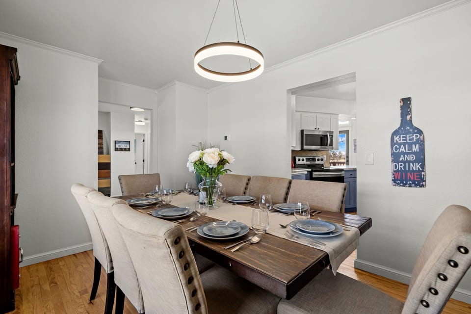 Gather around your elegant dining table for memorable meals, where stylish pendant lighting sets the mood for conversations.
