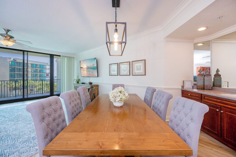 Gather around the spacious dining table, sharing laughter while enjoying the views of the lovely coastal landscapes